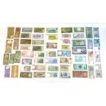 A collection of 135 international bank notes, including, China, Poland Sweden, Cuba, Indonesia,