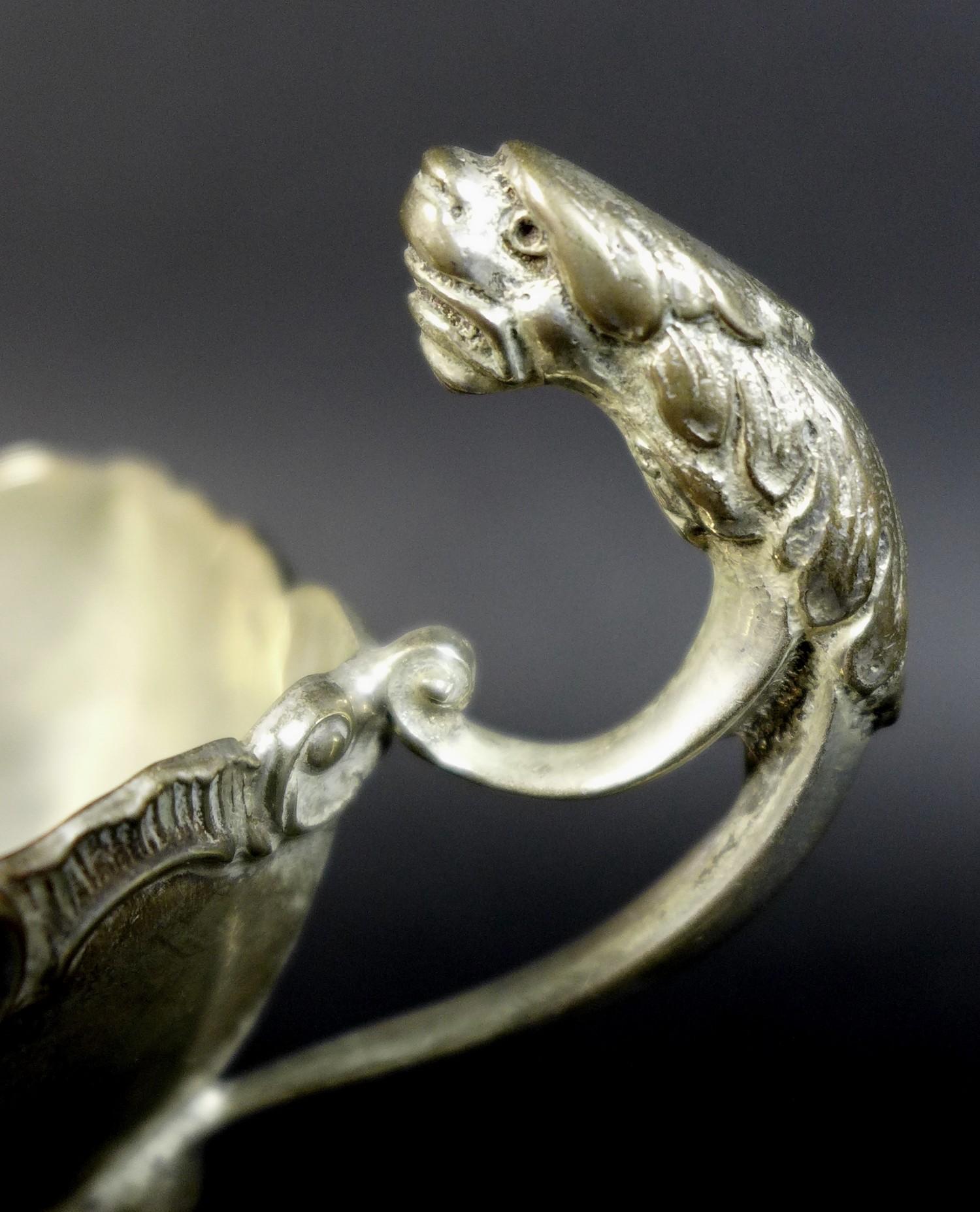 A pair of Edwardian silver sauce boats, the handles with cast jaguar heads, and scroll rim, raised - Image 5 of 15