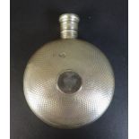 A Victorian silver circular hip flask, with screw top, engraved crest to one side, Thomas Johnson