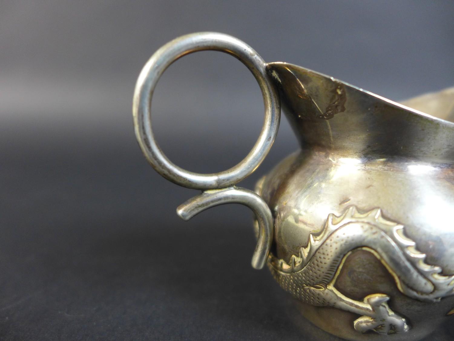 A Wang Hing and Co Chinese export silver jug, decorated with a sinuous dragon chasing his tail - Image 7 of 9