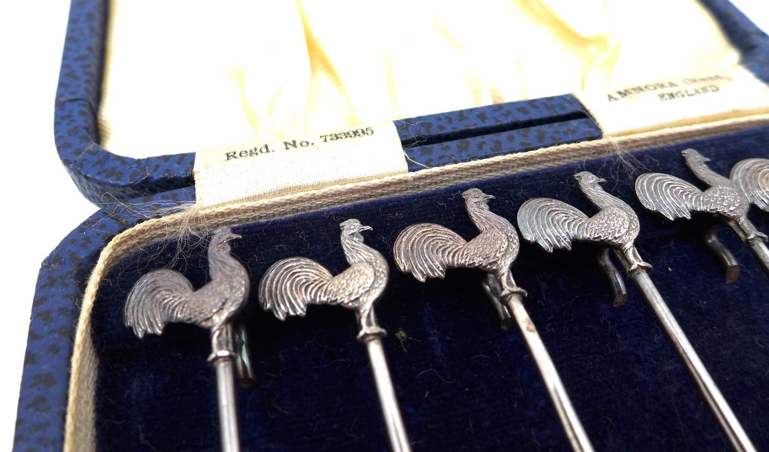 A set of six George V silver cocktail sticks, by Amnora, England, the terminals in the form of - Image 2 of 6