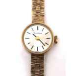 A Bulova 9ct gold lady's wristwatch, circa 1984, reference 7193, with textured 9ct gold bracelet