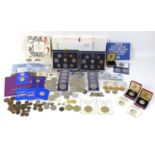 A collection of British coinage, including two sterling silver proof 1983 £1 coins, three proof