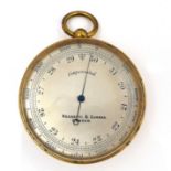 A late Victorian Negretti & Zambra, London, gilt brass cased pocket compensated aneroid barometer,