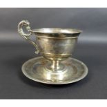 An early 19th century French silver cup with single lions head form handle and single stem