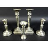 A pair of George V silver candlesticks, of stepped octagonal form, James Dixon, Sheffield 1919, 17cm