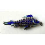 An enamel articulated fighting fish pendant, finely enamelled in turquoise and cobalt blue, 47.6mm