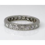 A full eternity ring, set with diamonds, size M, 3.5g.