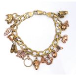 A 9ct yellow gold charm bracelet, kerb link with lobster claw clasp, fitted with sixteen 9ct