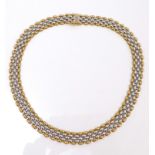 A 9ct gold bimetal necklace, of brick link form with each link of D section, spring clasp, maker GS,