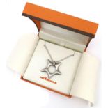 A modern Molecole silver pendant and chain, the pendant of unusual starfish design, the brushed