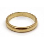 An 18ct yellow gold wedding band, maker LW, size M/N, 3.6g, in a modern black presentation case, and