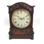 A Victorian mahogany bracket clock, the case with arched top and applied foliate decoration,
