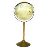 A late 20th century globe on stand by Replogle Globes USA, with turned beech wooden stand and