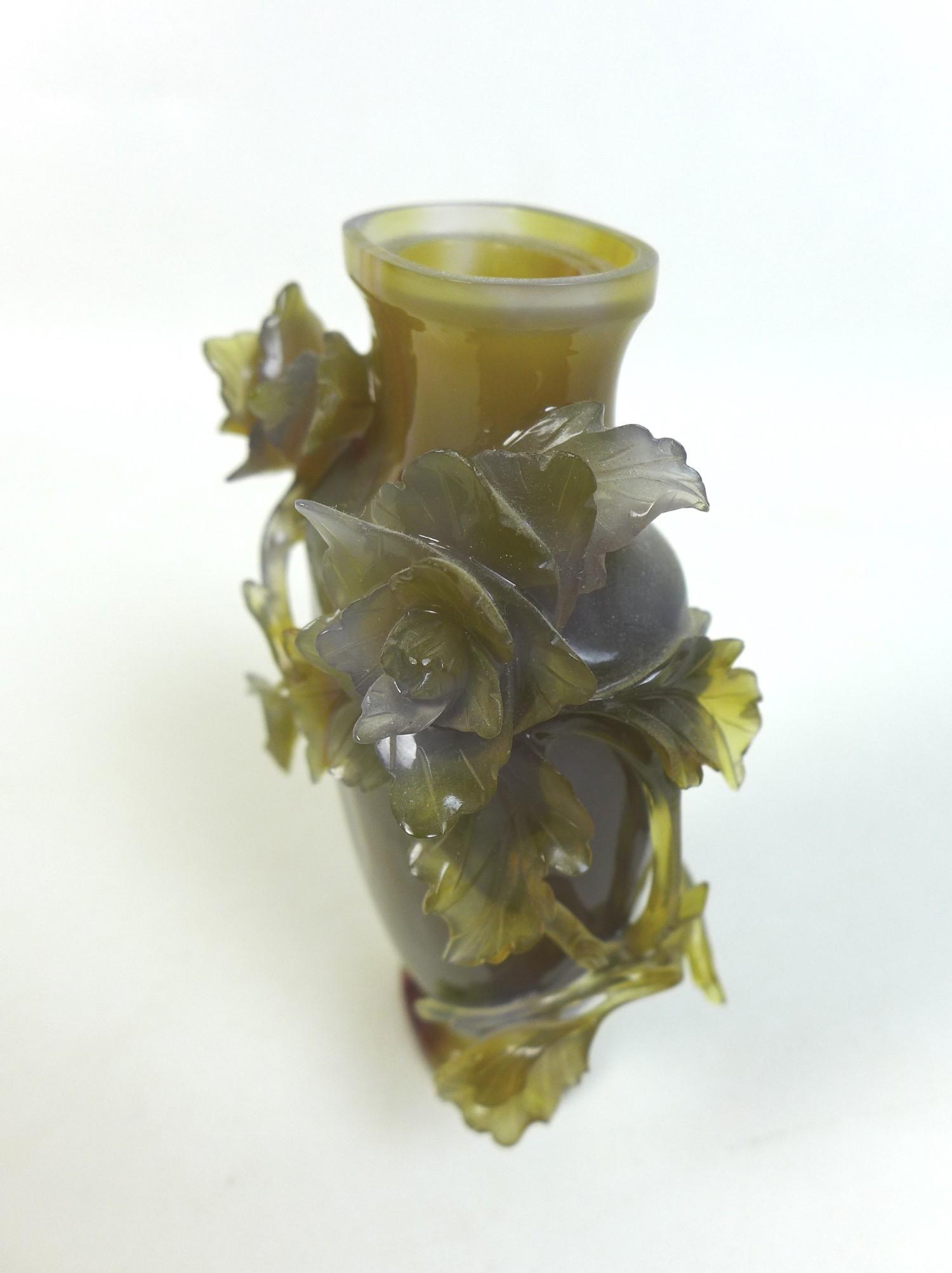 A Chinese agate vase, 19th century, intricately carved with chrysanthemums and trailing foliage. - Image 4 of 8