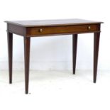 An Edwardian mahogany and inlaid side table, single frieze drawer with brass handles, raised on