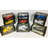 Nine Burago die-cast 1:18 scale cars, comprising a 1991 Bugatti EB 110 in blue, a 1987 Ferrari F40