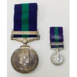 A ERII General Service medal and miniature, both with Malaya bars, bearing details 4190817 S.A.C.