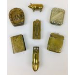 A group of Victorian and later brass novelty and decorative vesta cases, comprising an example