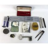 A group of miscellaneous collectables, including a Parker fountain pen with 14ct gold nib, further