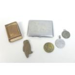 A group of six military related and other detectorist finds, comprising a Nazi Third Reich silver