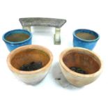 A pair of modern blue glazed garden planters, 50 by 40cm high, together with a pair of modern