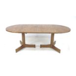 A British teak extending dining table, Robert Heritage for Archie Shine, circa 1960, with D ends,