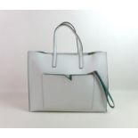 A large Nicoli Italian leather handbag, in two-toned off white and teal colours, with removable
