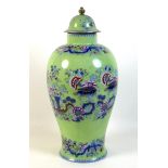 A Chinese style ceramic vase and cover, early 20th century, printed and underglaze decoration with