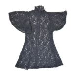 A 1969 Biba black lace mini dress, with Biba label, with flared neckline and butterfly sleeves,