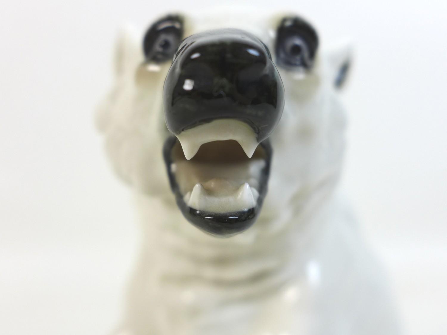 A 20th century Sitzendorf Polar bear figurine, the bear posed bearing teeth and rearing up from - Image 7 of 9