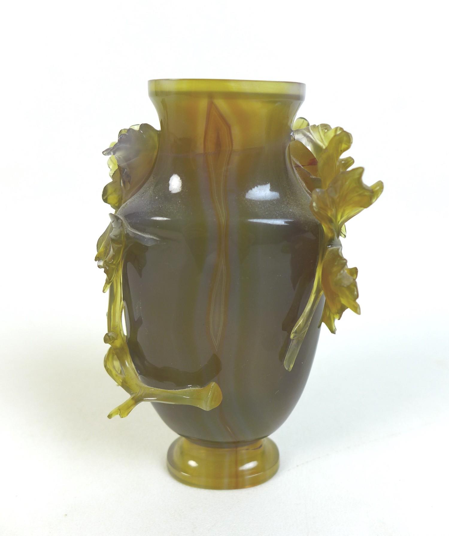 A Chinese agate vase, 19th century, intricately carved with chrysanthemums and trailing foliage. - Image 2 of 8