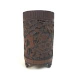 An early 20th century Chinese bamboo brush pot (bitong), of cylindrical form, carved with a