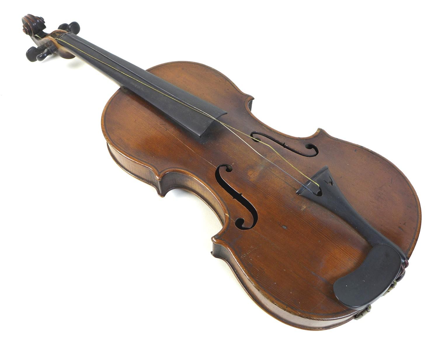 A 19th century violin, full size 4/4, well carved scroll, two piece back, outlined throughout with