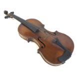 A 19th century violin, full size 4/4, well carved scroll, two piece back, outlined throughout with