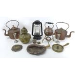 A group of copper and brass items, including an embossed spirit kettle, burner and stand, kettle,