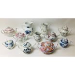 A group of eleven English 19th century and later teapots and water jugs, including a Chinese style