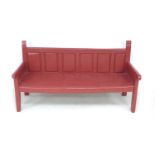 A Chinese style red painted pine bench, late 19th / early 20th century, with low six panel back,