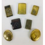 A group of seven Victorian and later vesta cases, comprising a bronze example with emblem for the