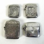A group of four Victorian and later silver vesta cases, all of rectangular form with hinged lids,