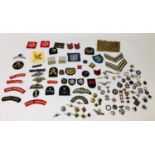 A collection of military and civilian badges, including a Zerbrugge dagger sweetheart brooch with