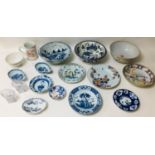 A group of fifteen 19th century and later Oriental and European ceramics, including a Chinese blue