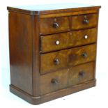 A late Victorian mahogany chest of two short over three long drawers with turned handles, 109 by