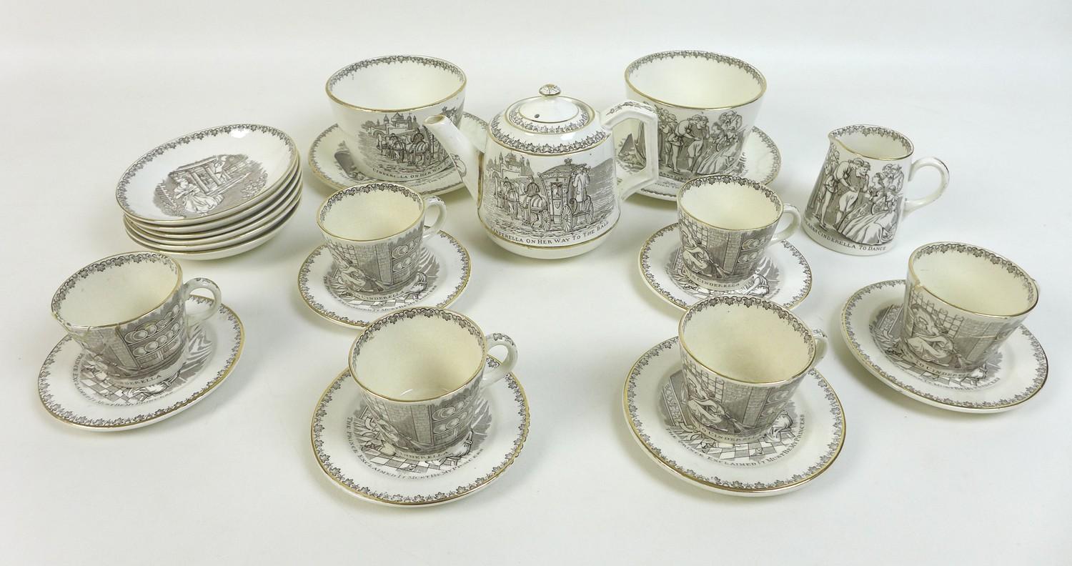 An unusual Victorian ceramic child's tea set, the whole decorated with scenes from Cinderella,