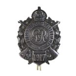 A WWI period silver marksmanship medal badge, The King's Shield, dated 1917, obverse with crown