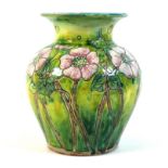 An Arts & Crafts Della Robbia (1897-1906) pottery vase, circa 1900, of baluster form with flared