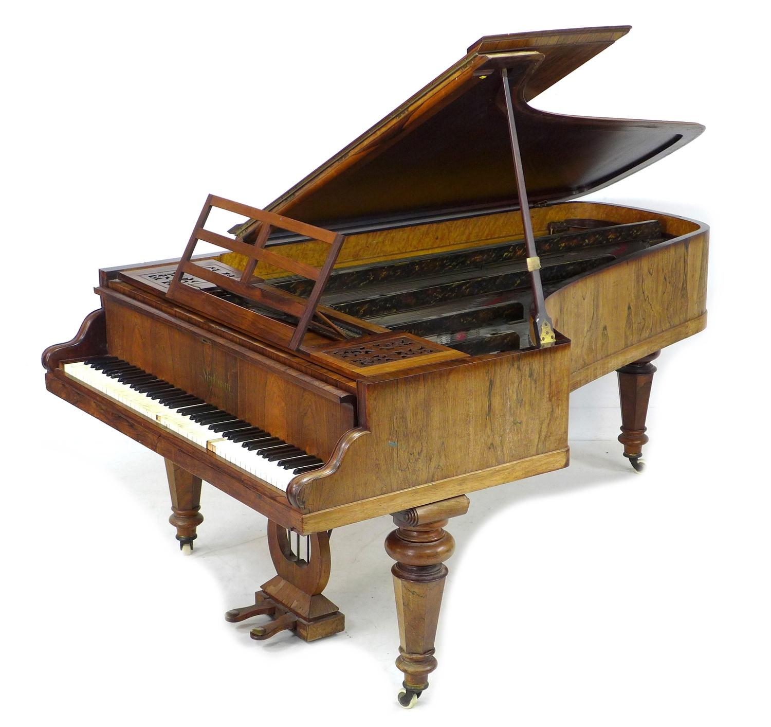 A Victorian Kirkman parlour grand piano, circa 1870, with rosewood veneered case, wooden frame and