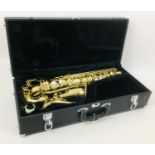 An Alpine Alto Saxaphone, with mother of pearl inlaid keys and 'Alpine Woodwinds Inc' inscribed to
