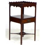 A George III mahogany and line inlaid wash stand, gallery with waved edge, single drawer, pierced