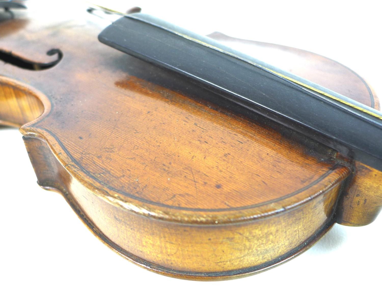 A 19th century violin, full size 4/4, well carved scroll, two piece back, outlined throughout with - Image 16 of 23